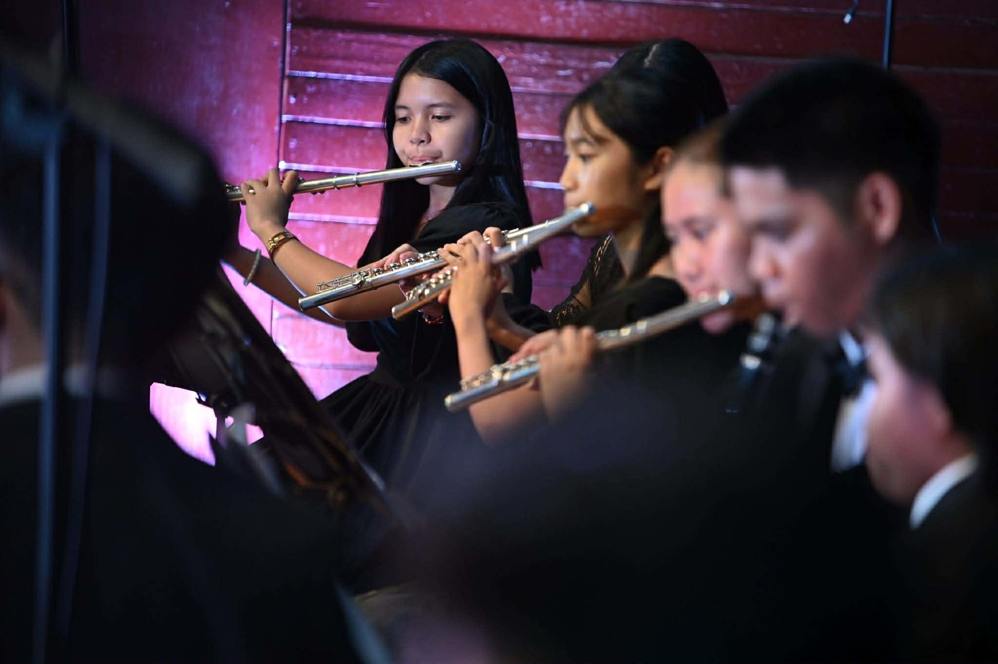 Flute section performing
