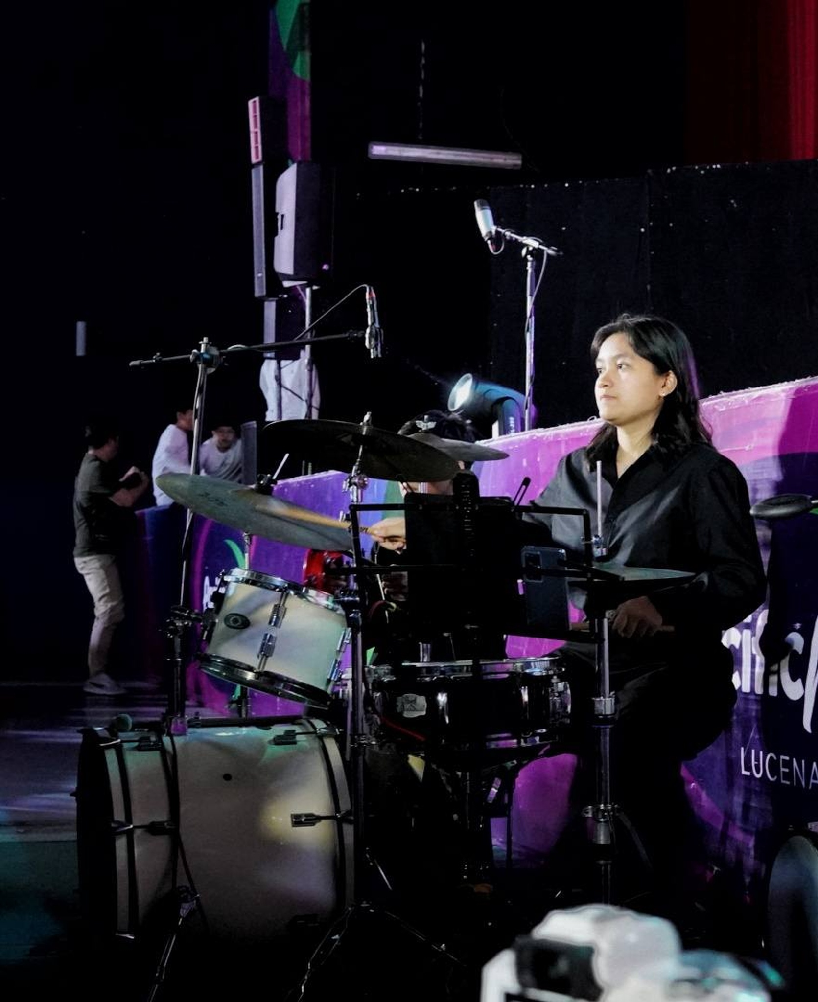 Drummer performing on stage